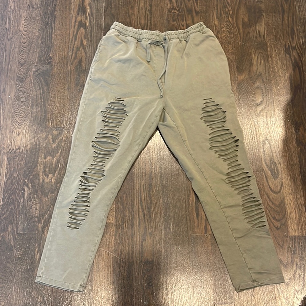 Olive green ripped sweatpants
